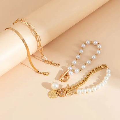 Zestaw bransoletek Chic Gold 4 szt. - Wąż, Perły i Ogniwa | Złoto