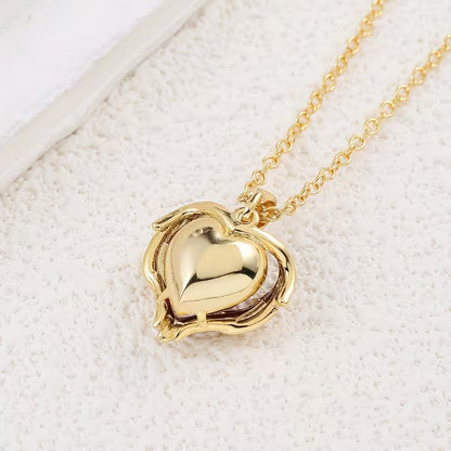 Naszyjnik Angel Embrace z rubinowym sercem | Złoto