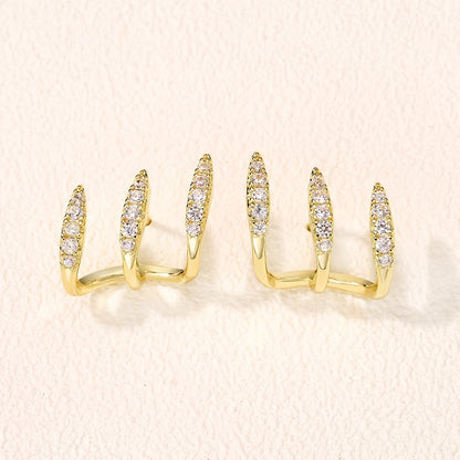 Eleganckie kolczyki typu stud z kryształkami górskimi i trzema ząbkami