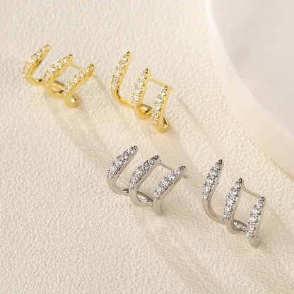Eleganckie kolczyki typu stud z kryształkami górskimi i trzema ząbkami