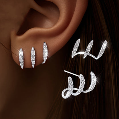 Eleganckie kolczyki typu stud z kryształkami górskimi i trzema ząbkami